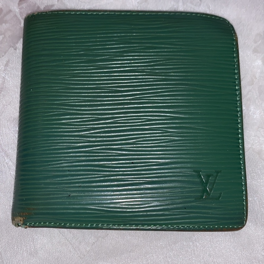 Authentic Louis Vuitton green Epi Leather wallet code # inside wallet .